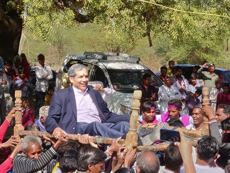 Dr. Camillus being carried by villagers in Tuvar, India