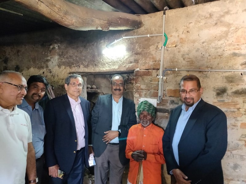 Dr. Camillus and Subi Rajagopalan with group in home in Tuvar, India