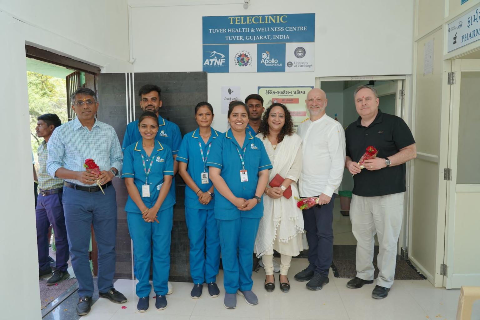 Ariel Armony and Tom O'Toole visit with the THWC staff in Gujarat, India