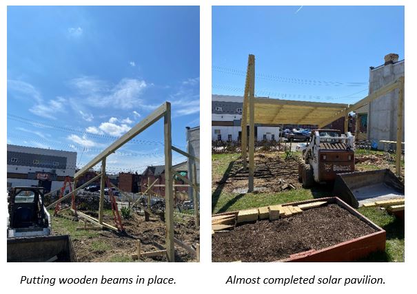 Building of wooden solar pavilion structure in Homewood, PA.  