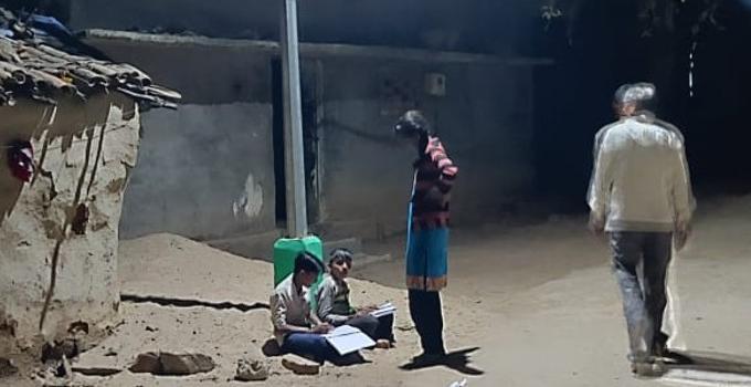 children under street lights